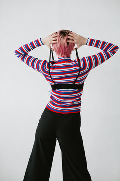 Woman fooling with bra