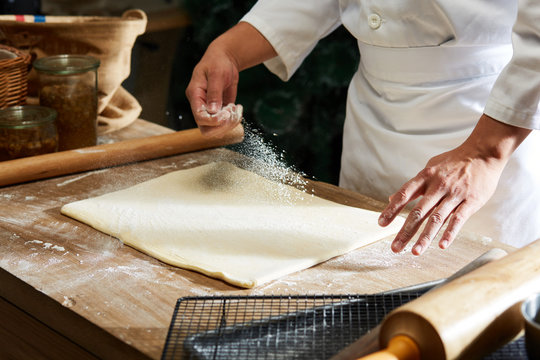 The process of making cantonese bread by hand is done in a sunshine making workshop