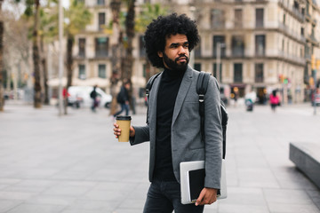 Afro businessman in the city.