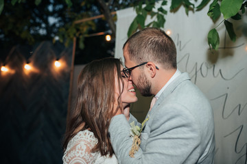 Wedding photography kiss bride and groom in different locations