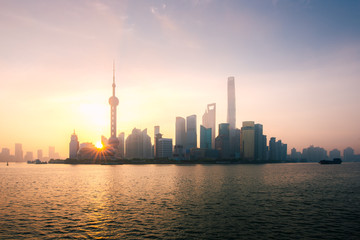 Fototapeta na wymiar Shanghai, China city skyline during sunrise on the Huangpu River.