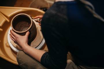 Potter Working on Pottery in Studio