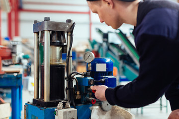 Man reparing a industrial pump