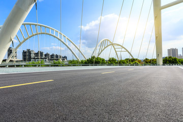 Empty asphalt road and bridge construction in shanghai