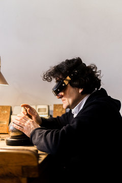 Man making handmade rubber stamp