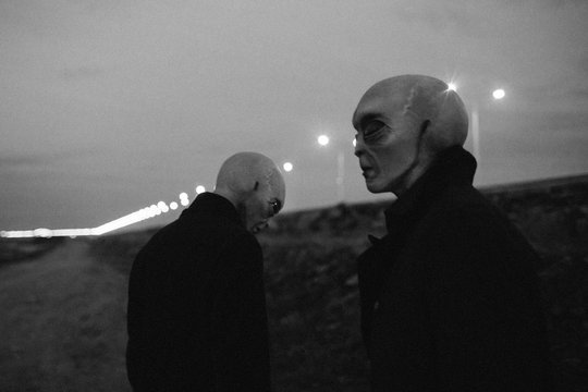 Aliens approaching the highway at night