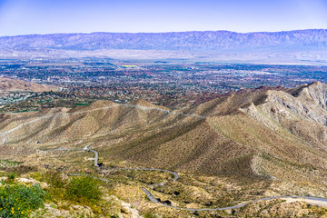Fototapeta premium Aerial view of Coachella Valley and the road leading to it, California