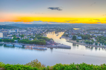 Sunset aerial view of confluence of Rhein and Mosel rivers in Koblenz, Germany