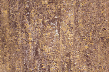 yellow white gray brown spotted granite surface. rough texture