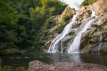 Naklejka na ściany i meble Beautiful waterfall in Thailand National Park 