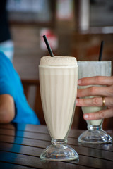Milkshakes on the table about to be drunk