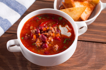 Delicious soup with beans, garlic and fresh tomatoes