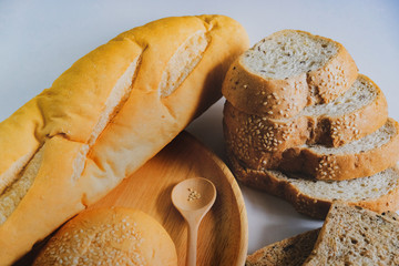 sliced wholegrain bread on a wooden table. food 