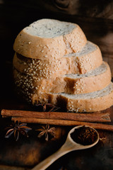 sliced wholegrain bread on a wooden table. food 