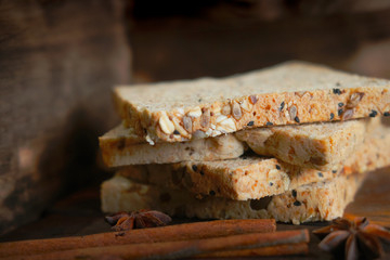 sliced wholegrain bread on a wooden table. food 