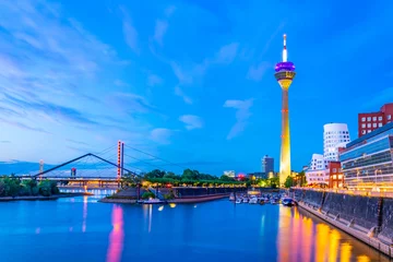 Sunset view of the Rheinturm in Dusseldorf, Germany © dudlajzov