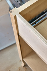 Production of wood furniture. Bathroom vanity cabinet. Furniture manufacture. Close-up