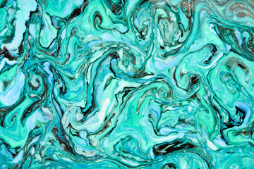 Beautiful abstract painting is a painting technique Ebru .Turkish Ebru style on the water with acrylic paints wring wave.Stylish combination of luxury.Contemporary art marble liquid texture    