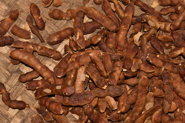 the processing of Imli or the tamarind for later use.