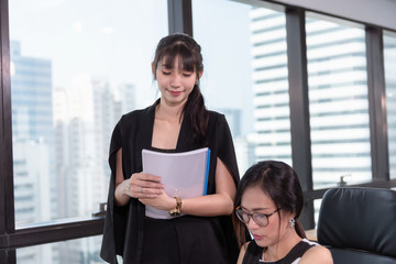 Secretary Assistant Woman Team is Offering Business Execution of Financial Contract Agreement for Her Manager in Office Workplace. Business Finance Teamwork and Occupation Concept.