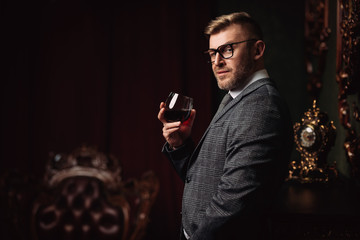 man drinking wine
