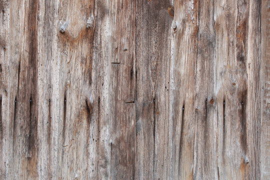 Brown wood texture. Paint on the boards with cracks, scratches, chips, dust. Can be used as background for design or poster. © INTHEBLVCK