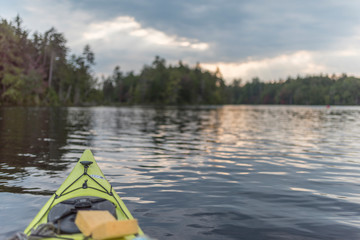 a neon kayak with a spong