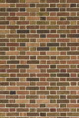 Flemish bond pattern vintage brick wall background with earth tone hued brown brickwork