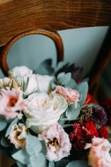 A bright modern bouquet on a white background. Wedding decor and minimalism.