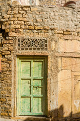 Fototapeta na wymiar traditional grungy door of Indian village house