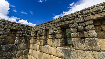Blue sky above the walls of Machu Picchu
