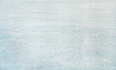 Abstract texture of water on the ice surface. 