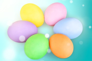 Colorful easter eggs on desk