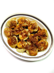 Fried boiled egg with tamarind sauce