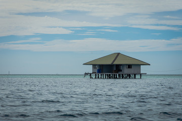 Traditional floating cottage that abandoned by residents of Harapan Island, Indonesia