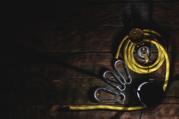 Travel or adventure equipment and accessories abstract flat lay background. Compass, safety rope,...