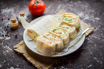 Lavash roll with cottage cheese and sweet pepper.