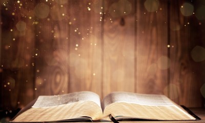 Holy Bible  book on a wooden background