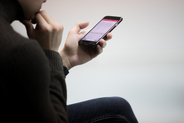 man, student, businessman sitting with a phone