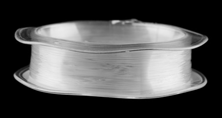 fishing line isolated on black background close up