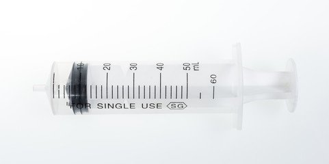 Empty medical syringe (needle) on white background