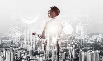 Concept of business success and control with confident boss against cityscape background