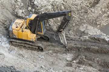 excavator on ground at construction site