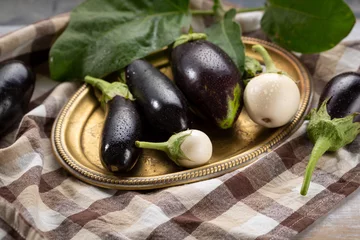 Foto op Plexiglas Fresh eggplants mix on platter © Olha Afanasieva