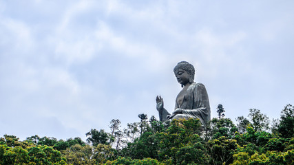 Fototapeta na wymiar Giant Buddha of Po Lin Monastery at Lantau Island Hong Kong with blue sky