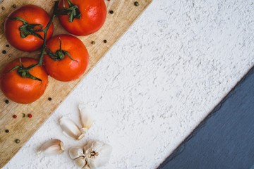 Flat lay with white background with Vegetables and flowers