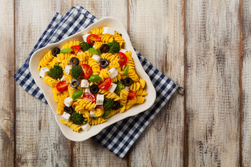 Fototapeta na wymiar Salad with pasta and feta cheese