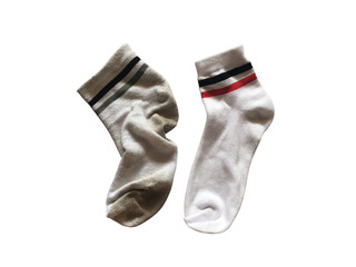 Used and new soft socks isolated on white background