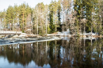 Long exposure photo. Dam and threshold on the river Jokelanjoki, Kouvola, Finland