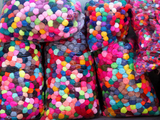 Closeup colorful fabric balls.
